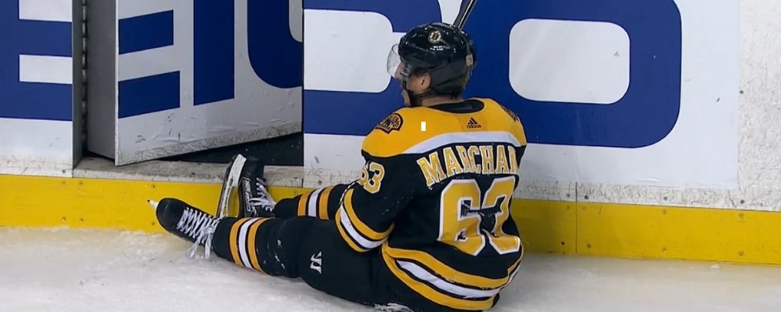 Brad Marchand takes a crosscheck to the chest and gets called for a penalty. 