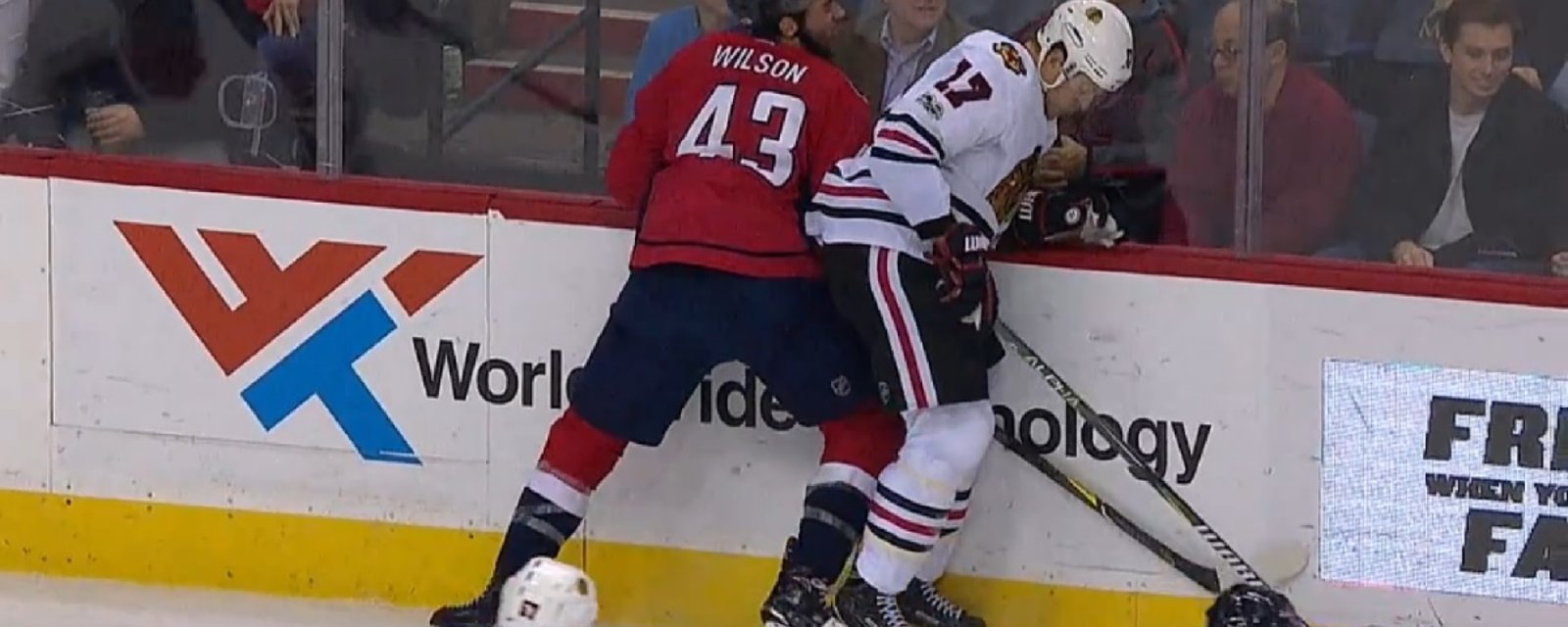 Breaking: Tough guy Tom Wilson injured after big hit along the boards.