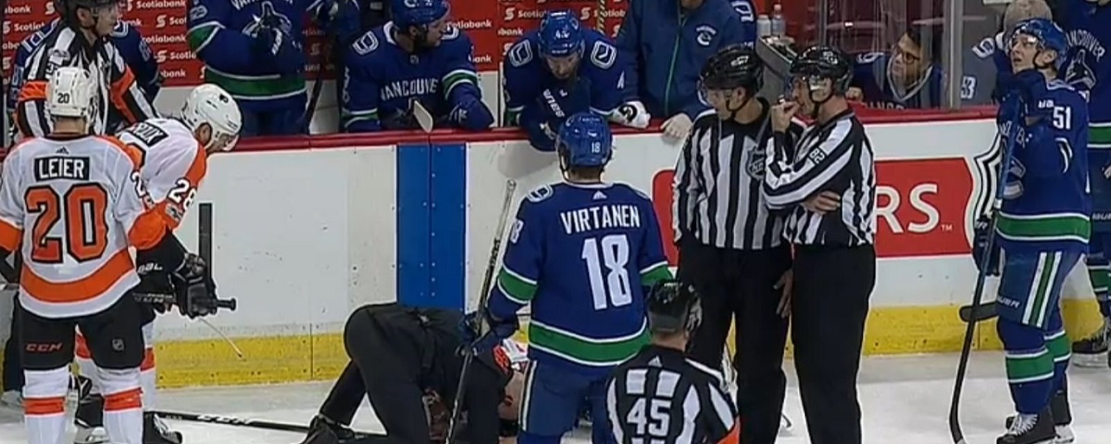 Young player injured after violent collision with NHL referee.