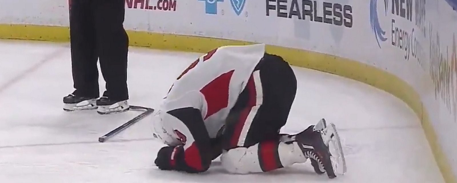 Breaking: Bobby Ryan gets crushed by a huge hit behind the net.