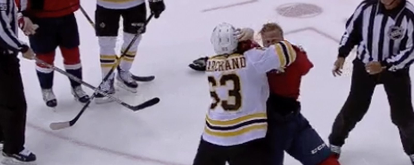 Brad Marchand jumps Lars Eller and DROPS him with a HUGE right hand!