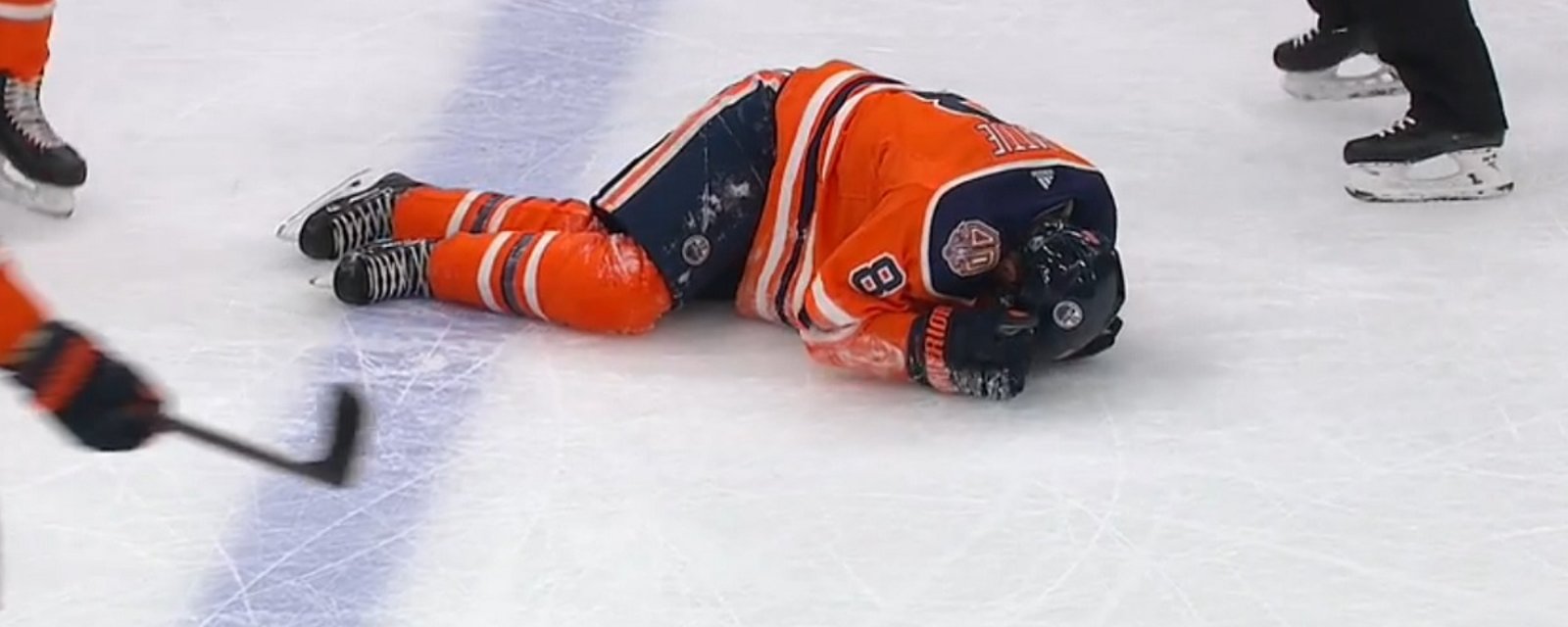 Oilers forward Ty Rattie goes down hard on Saturday.