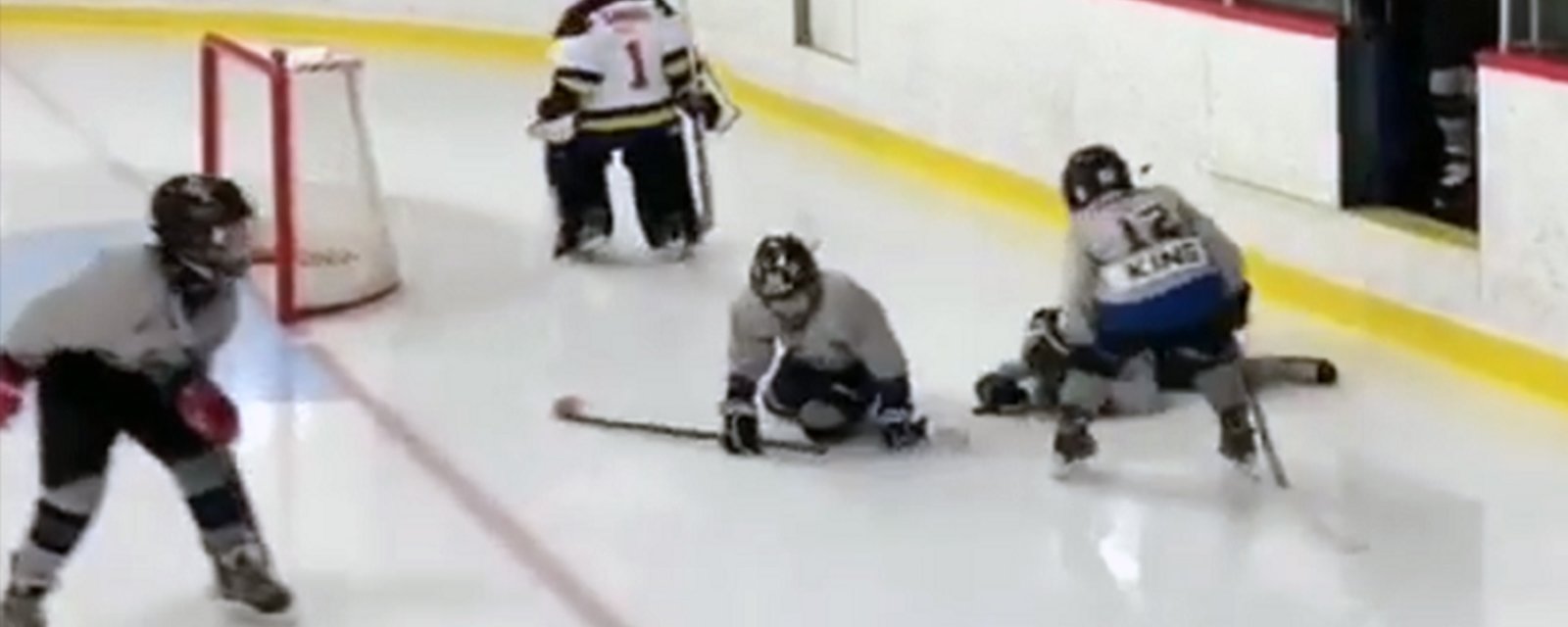 Minor hockey players pile onto the ice in cutest video you’ll see all week