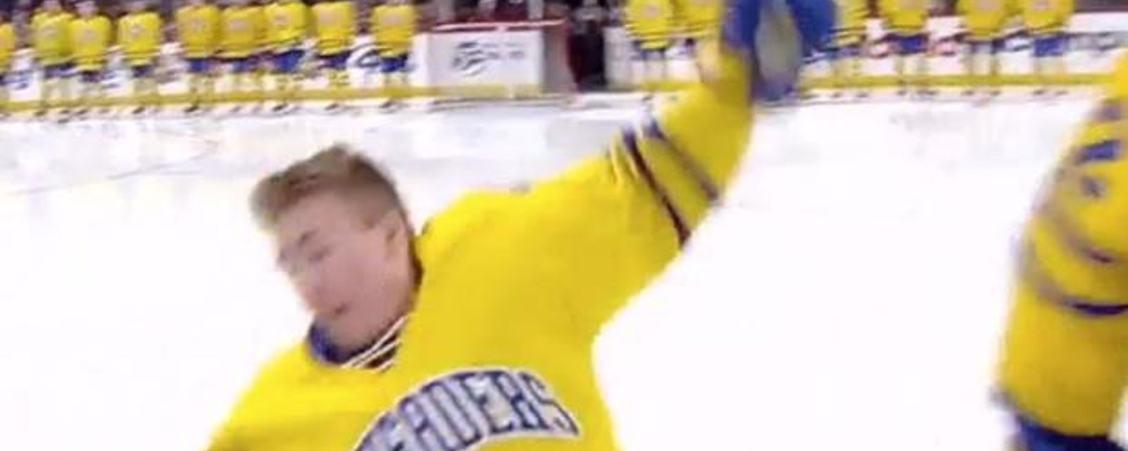 Hockey player absolutely wiped out during his player intro! 