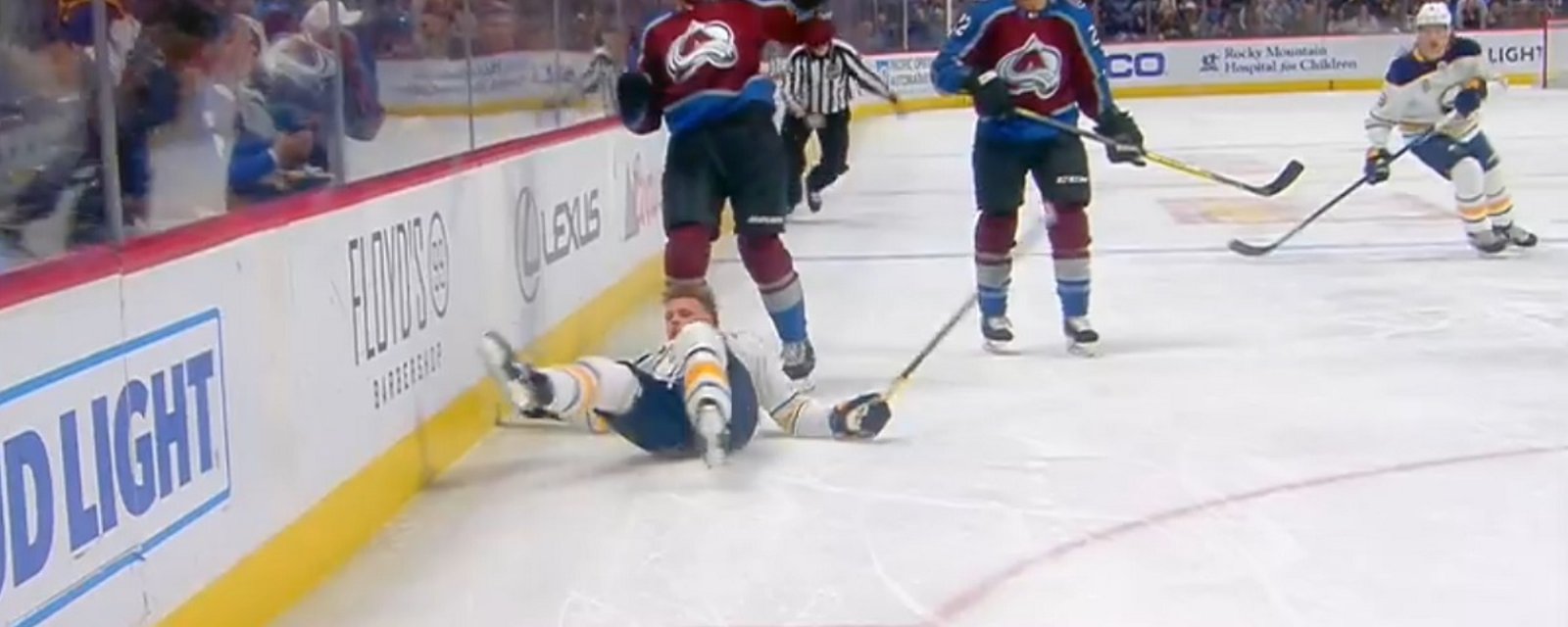 Zadorov levels Jack Eichel after the whistle has blown.