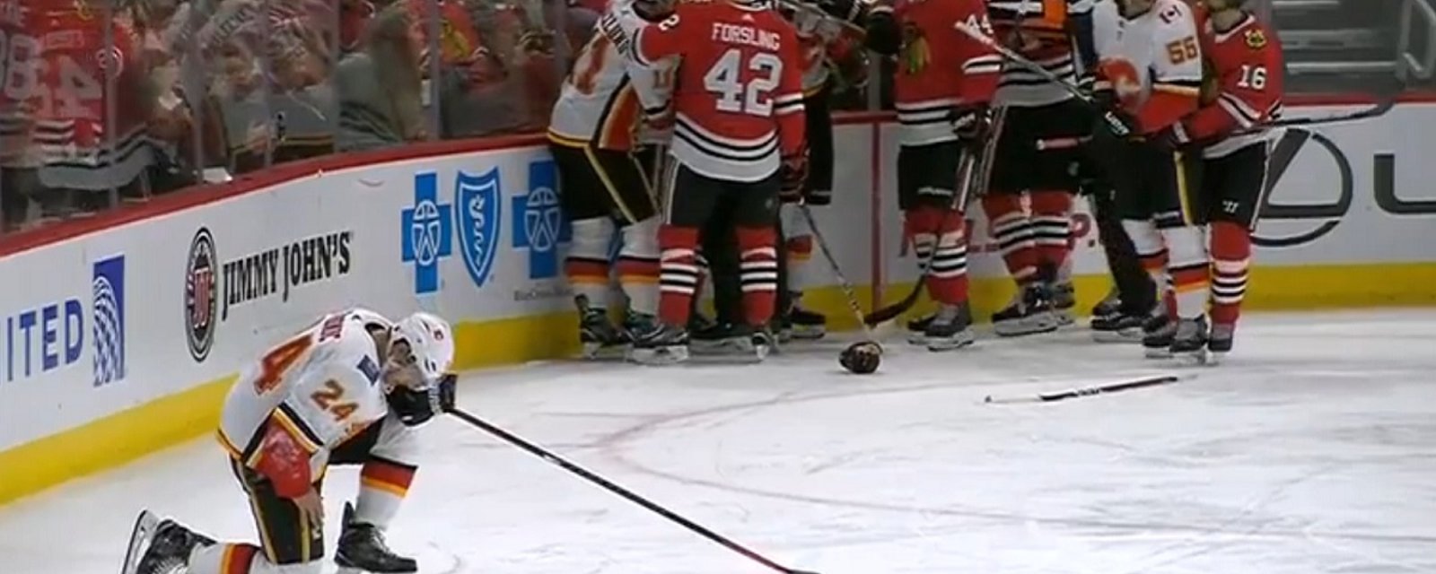 Kunitz ejected for a vicious elbow to Hamonic's head.