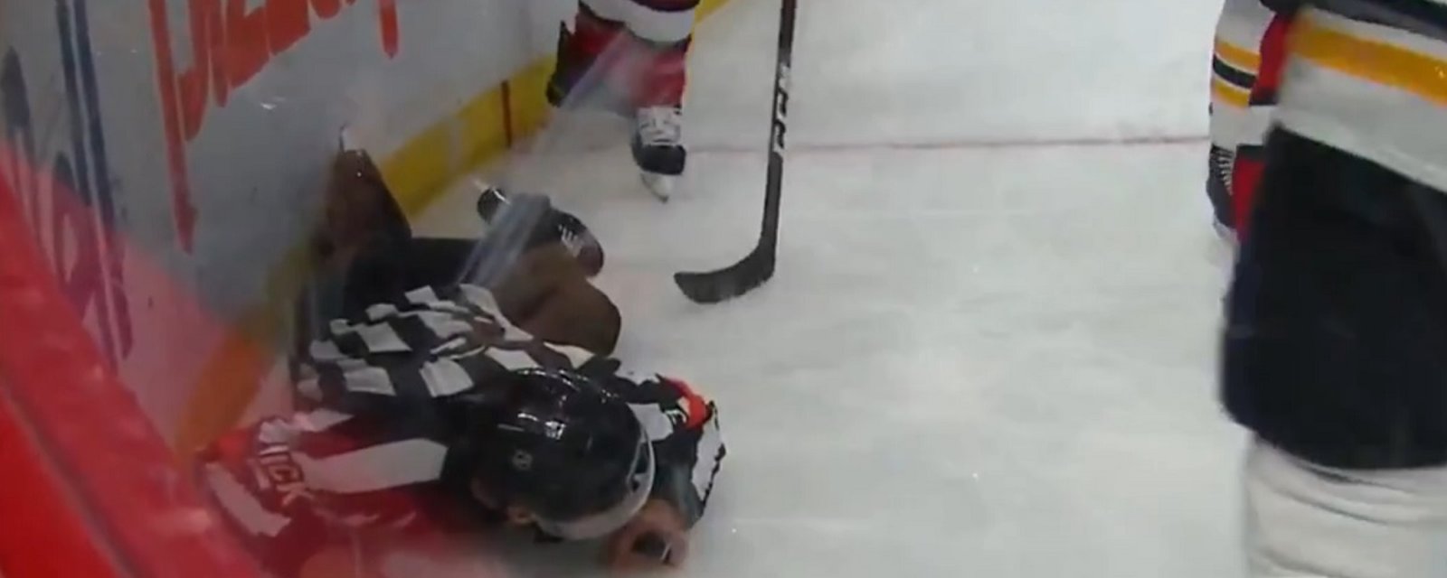 Brad Marchand takes out an NHL official after a big hit.