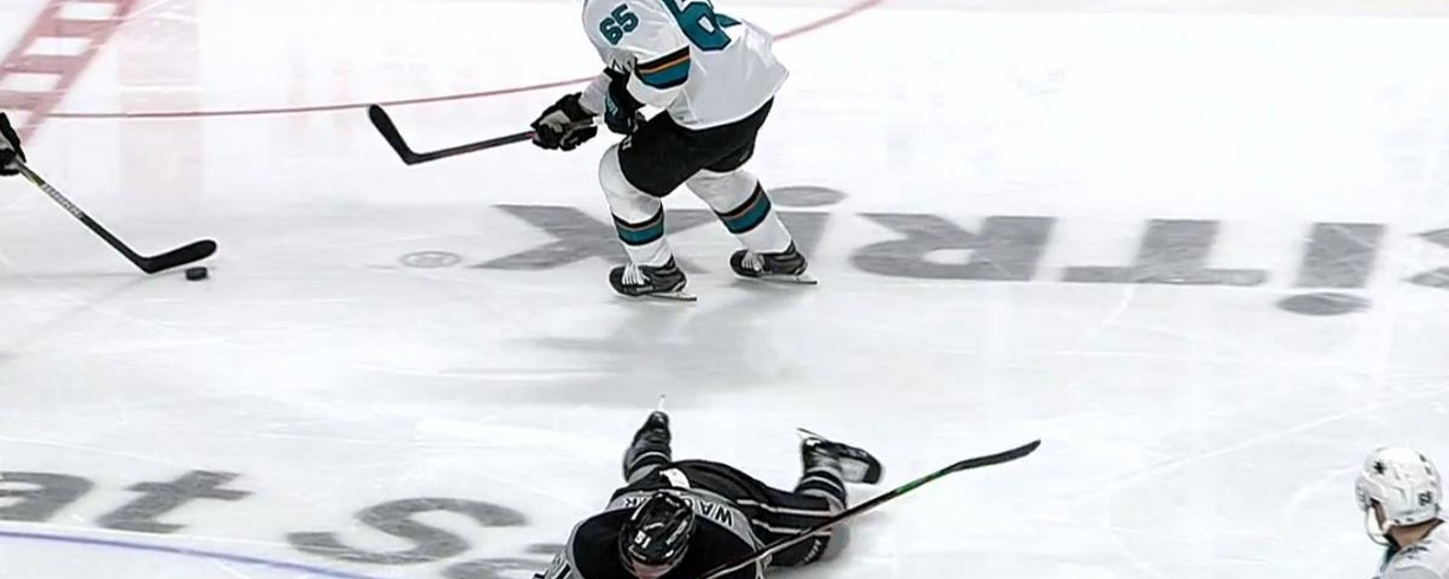 Erik Karlsson sends rookie to the locker room with an ugly head shot.