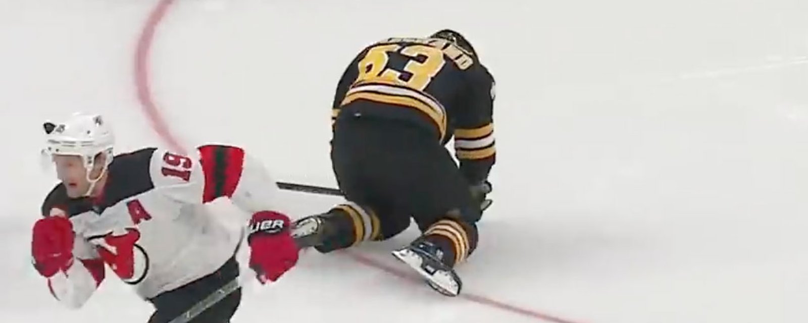Marchand leaves game woozy with head injury; refs ignore the penalty! 