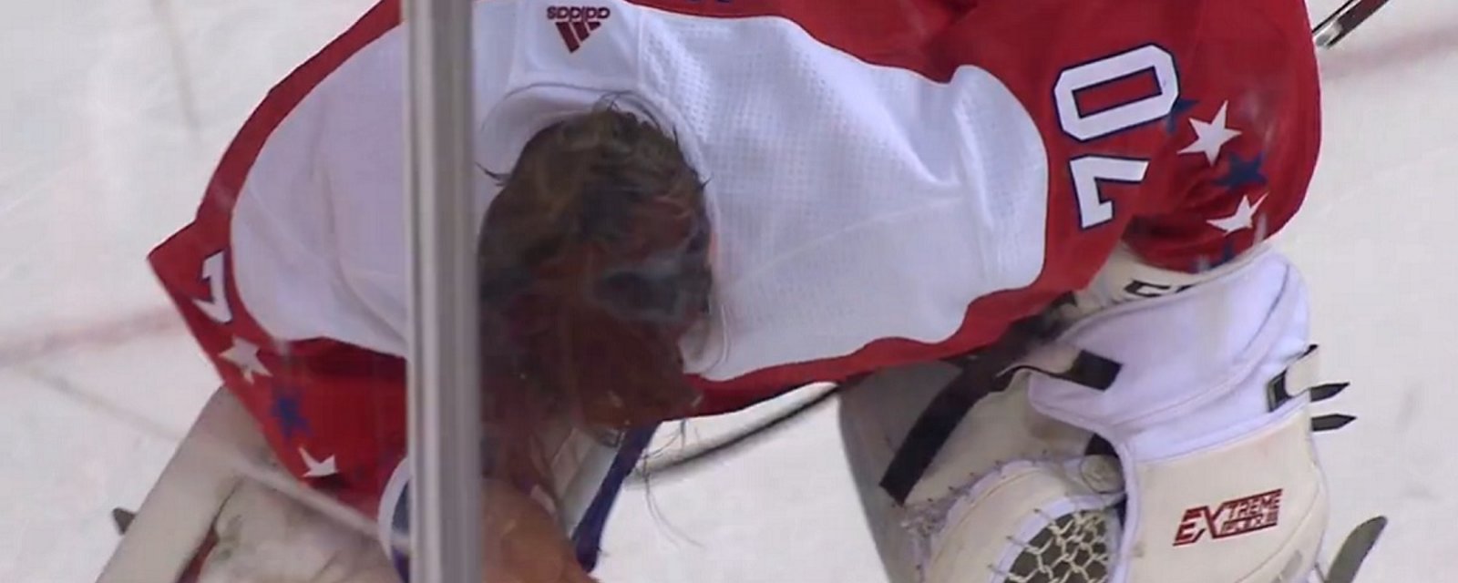 Breaking: Holtby leaves the game after Atkinson's stick goes through his mask.