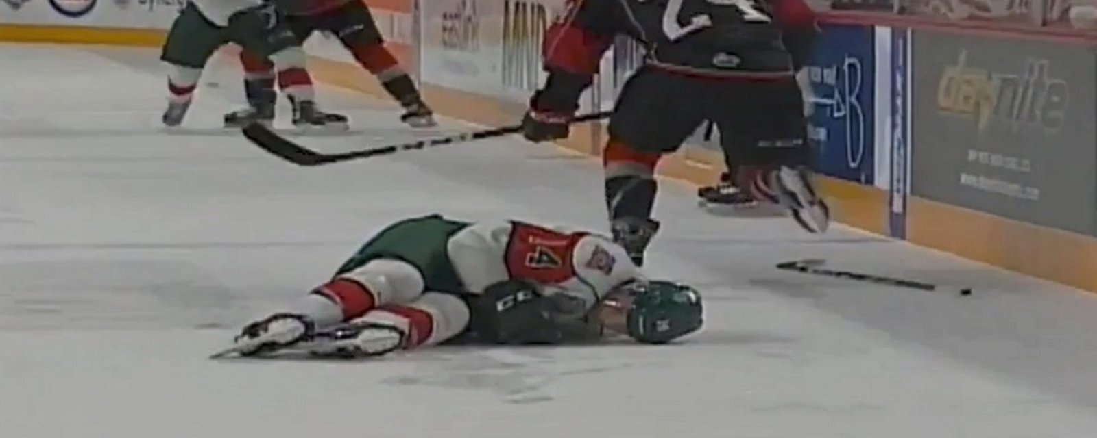 Red Wings prospect laid out by brutal knee on knee.
