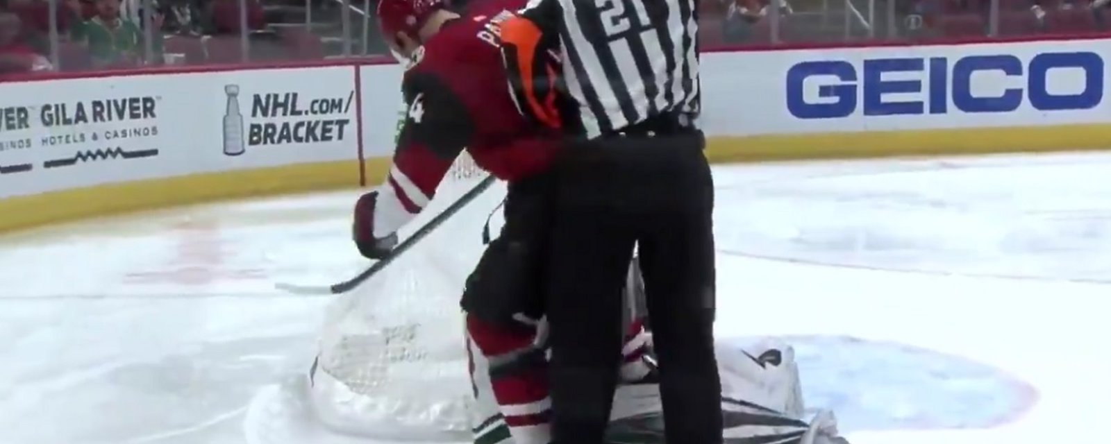 Dubnyk throws a tantrum and refuses to let go of Panik's leg.