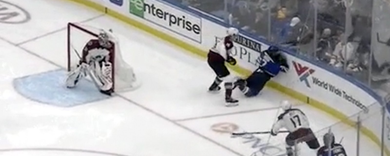 Zadorov crosschecks Maroon face first into the end boards.