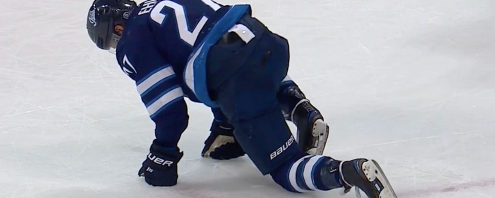 Ehlers collapses in pain on the ice but stays on to help the Jets 