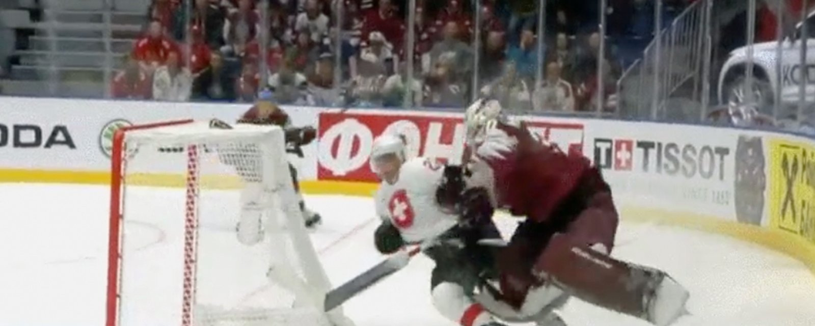 Latvian goaltender lays out Nico Hischier at World Championships