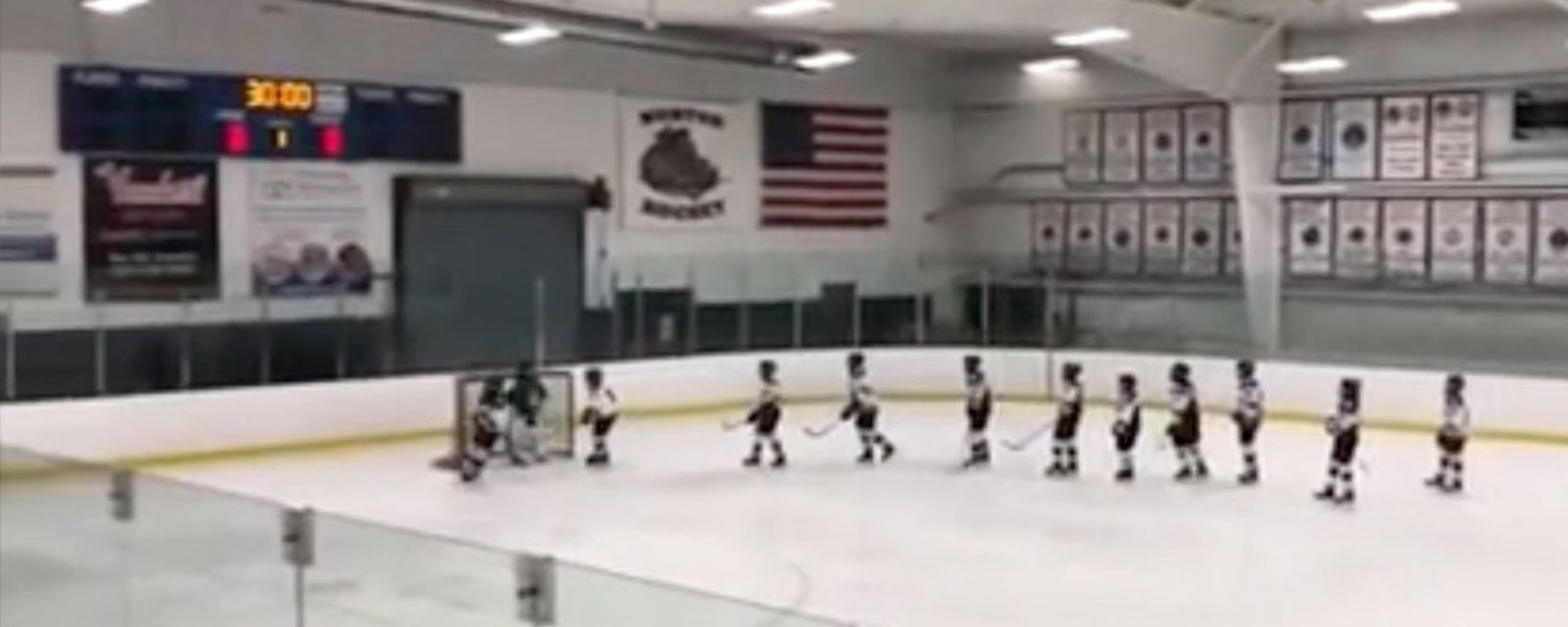 Peewee team pays tribute to opponent who recently lost his father