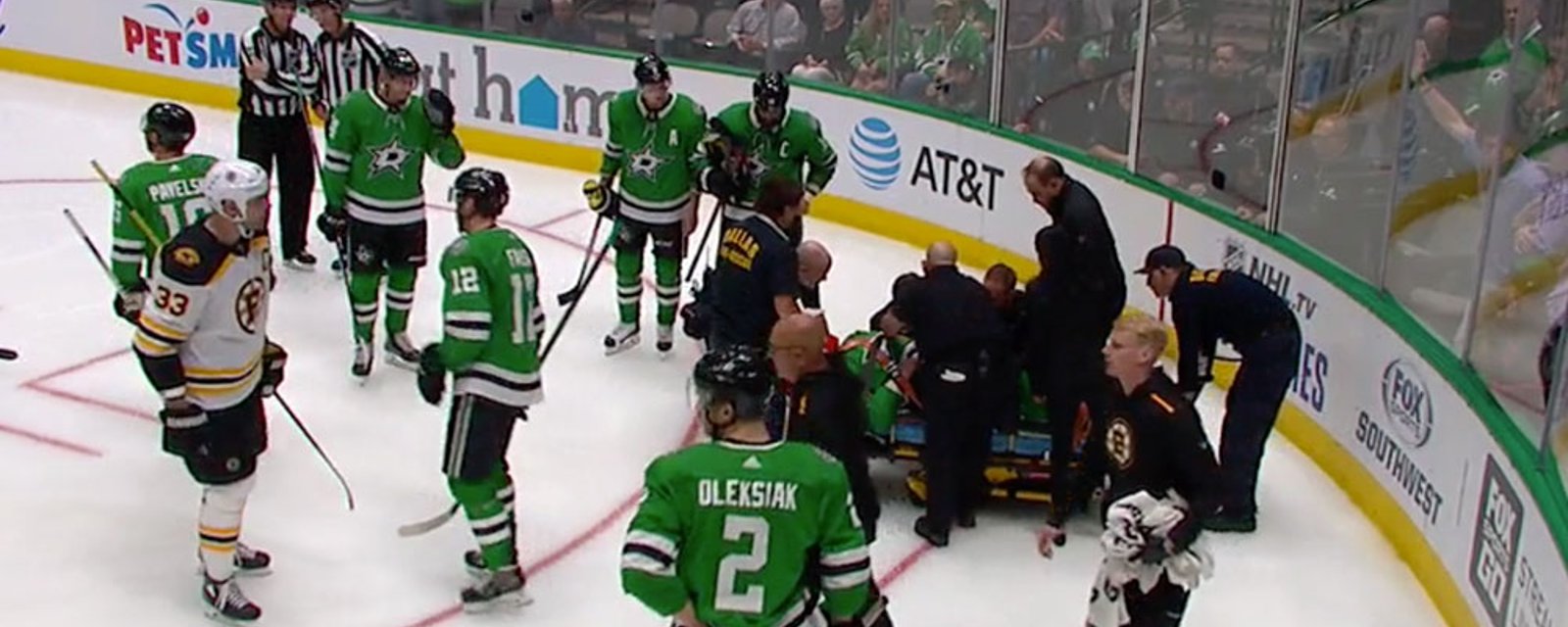 Polak stretchered off the ice after going head first into the end boards