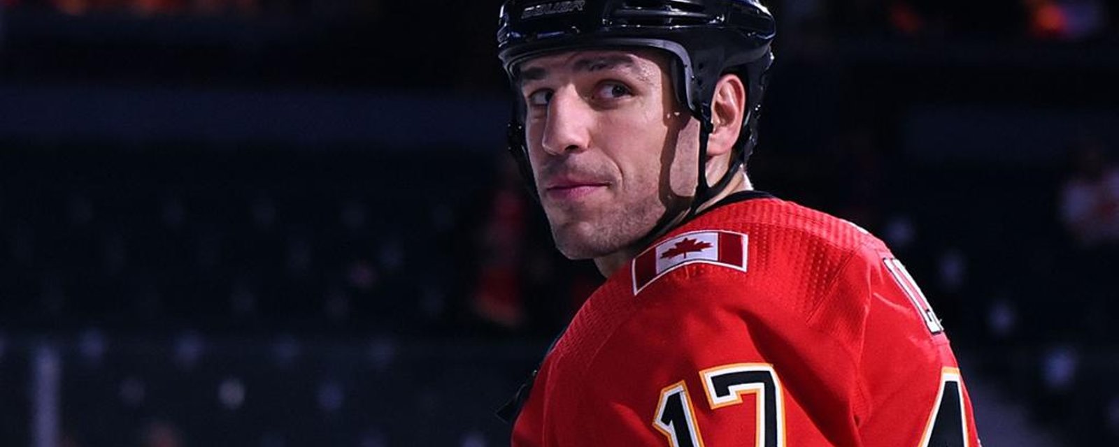 Lucic signed jersey with “Flames suck” written under his signature