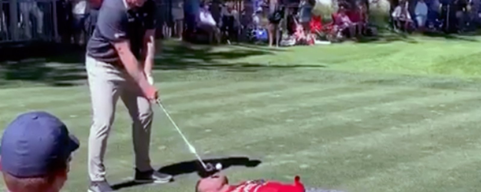 Roenick tees off on a fan, literally!