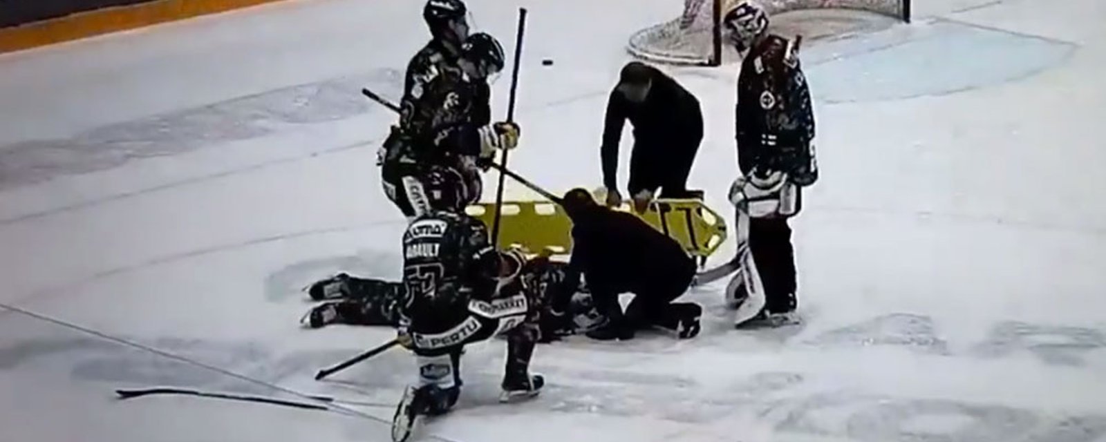 Canes top prospect Patrik Puistola stretchered off the ice after nasty hit! 