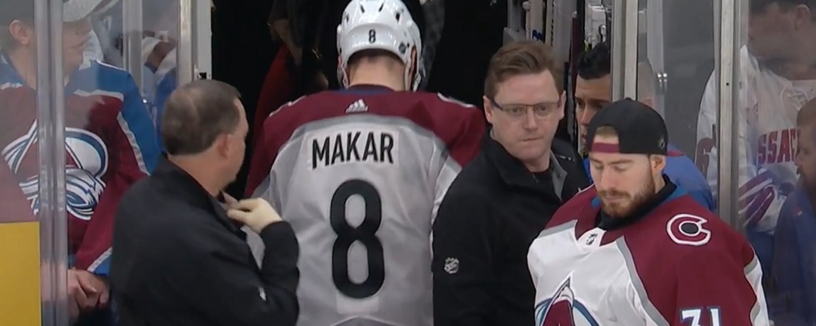 Cale Makar injured after a hit from Brad Marchand.