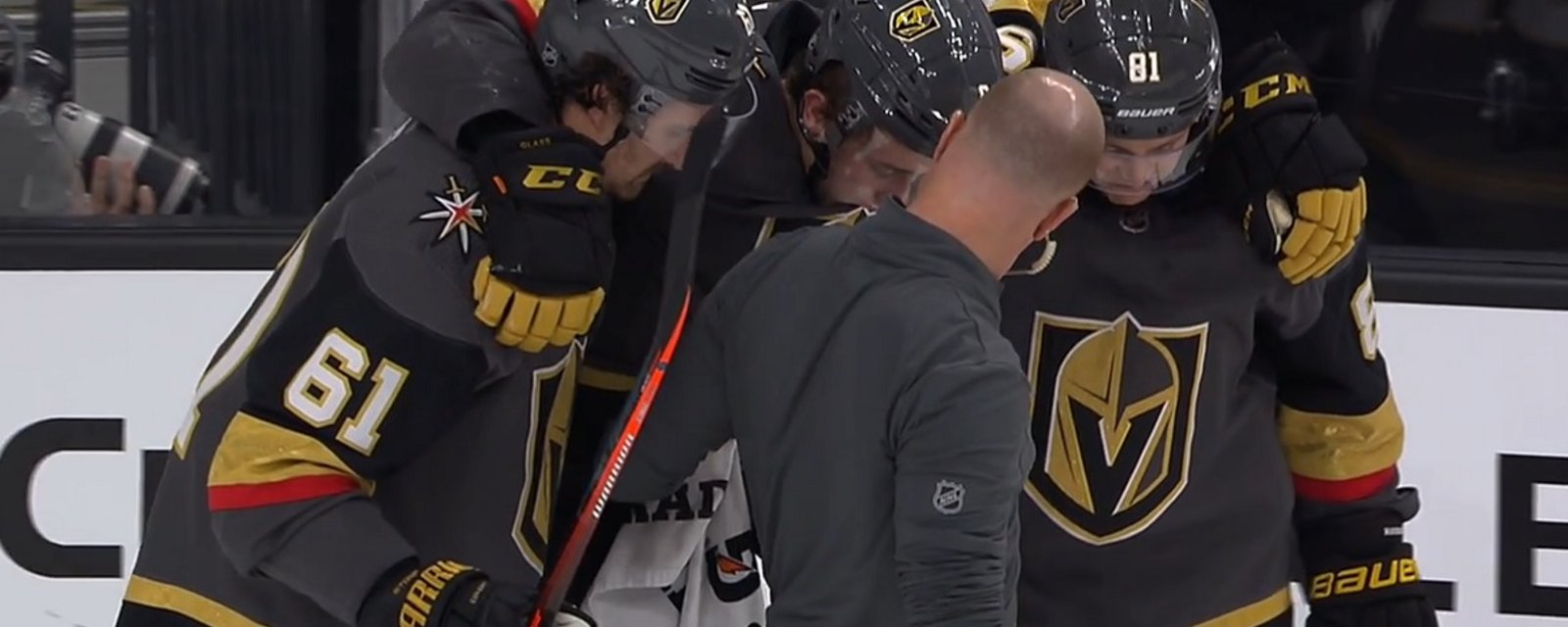 Cody Glass carried off the ice after taking a spinning elbow to the back of the head.