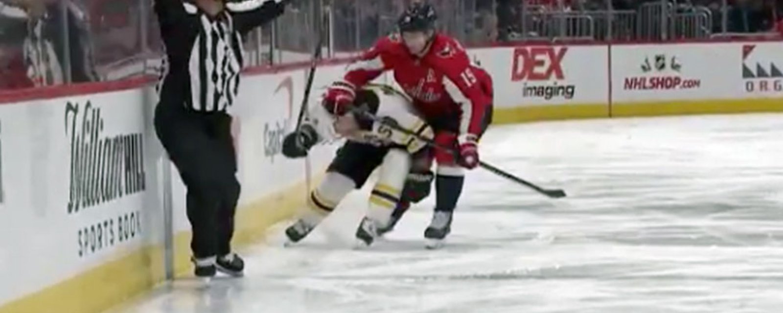 Marchand takes a butt end to the head from Nicklas Backstrom