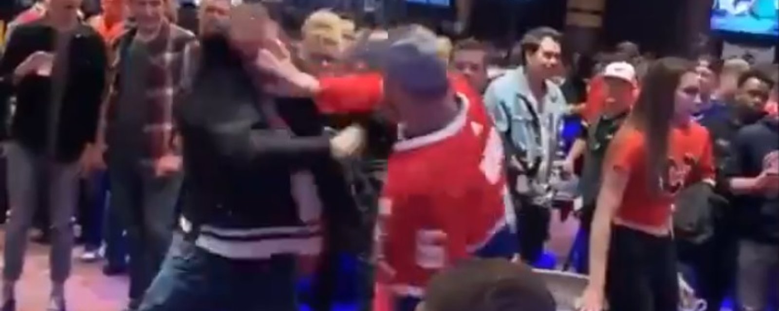 Cameras catch wild brawl between Canadiens fans in Calgary.