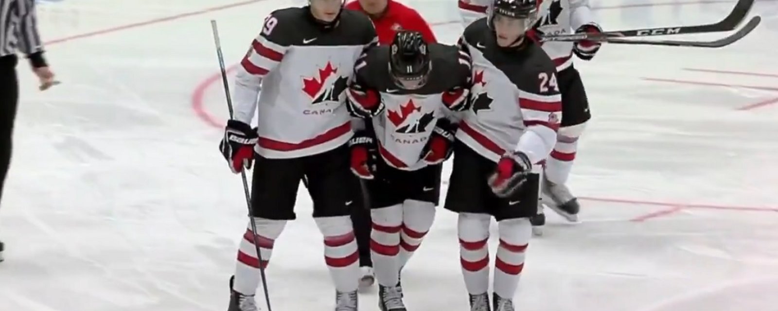 Projected #1 pick Alexis Lafrenière injured at the World Juniors.