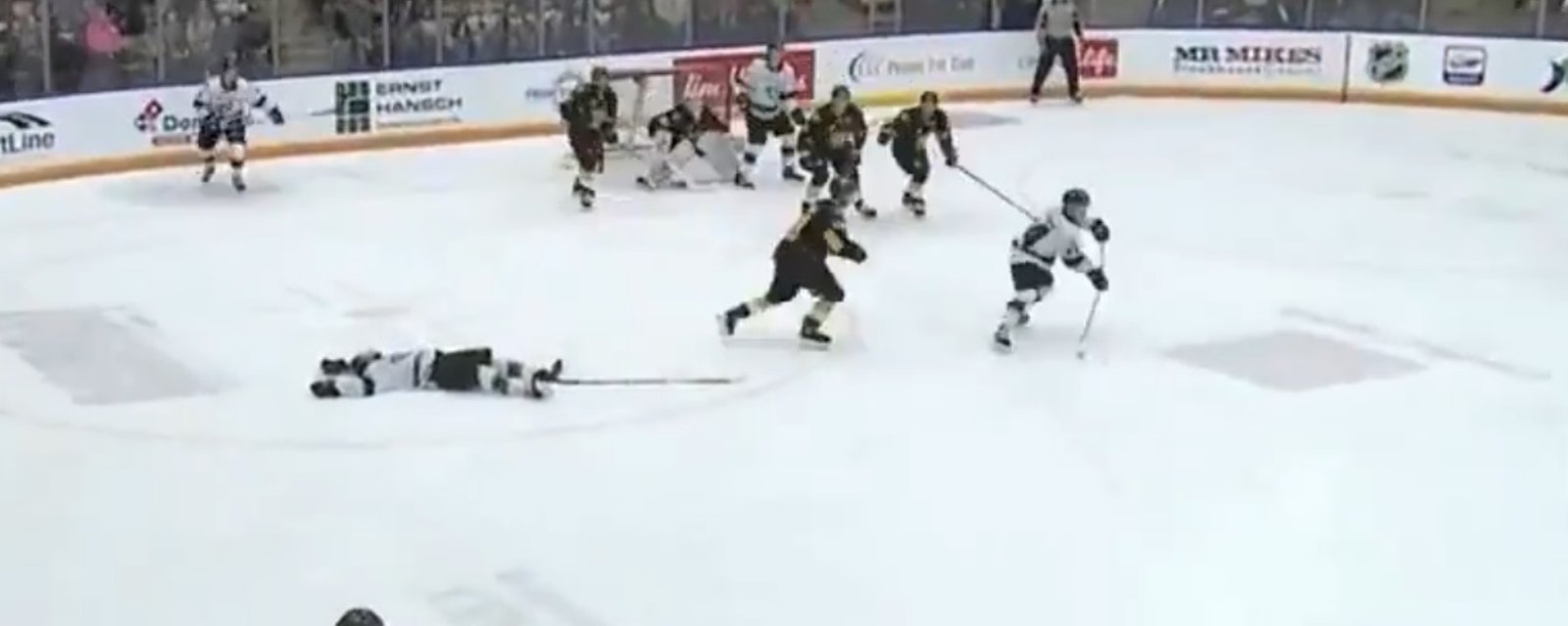 Open ice hit in the WHL leaves player out cold.