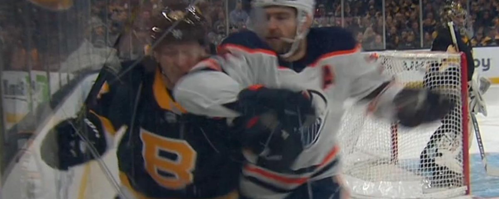 Leon Draisaitl delivers a blatant elbow to the head of Torey Krug.