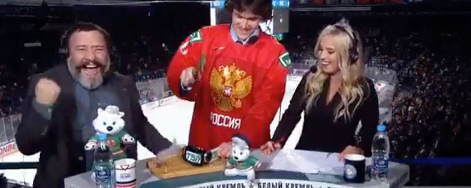 Russian junior player Voronkov smashes a “TSN” camera with a hammer during KHL intermission