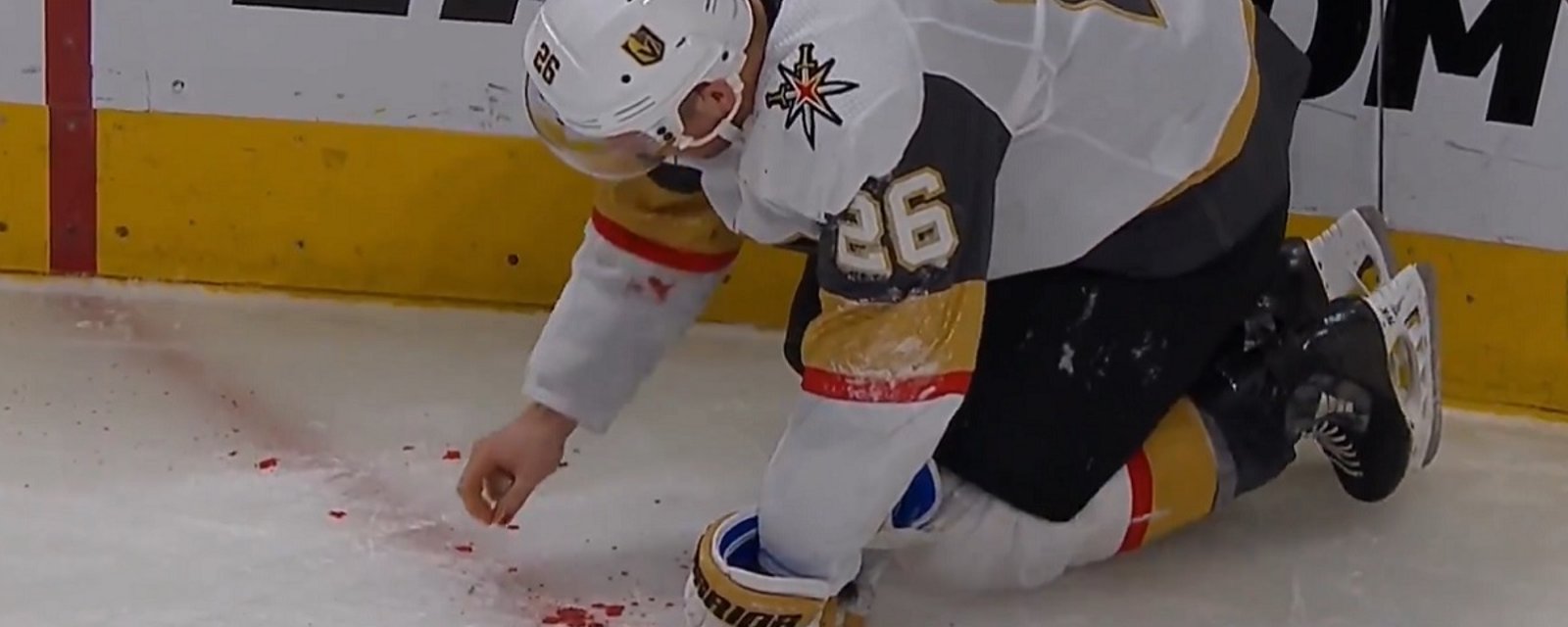 Paul Stastny forced to pick his teeth up off the ice after taking a wicked shot to the face.