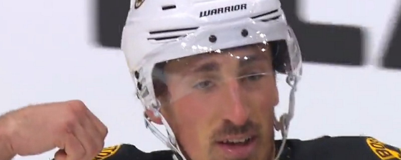 Brad Marchand flexes on Nikolaj Ehlers after dropping the gloves.