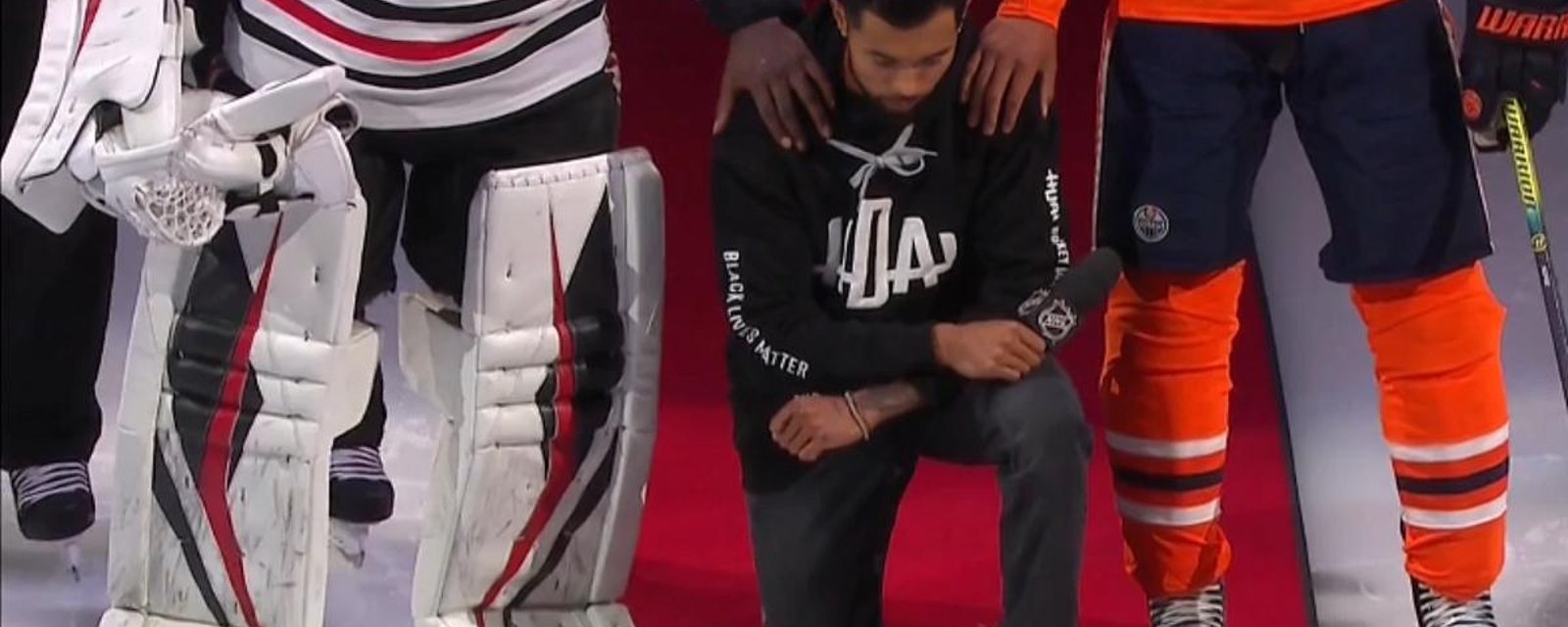 Matt Dumba becomes the first NHL player to kneel during the anthem.
