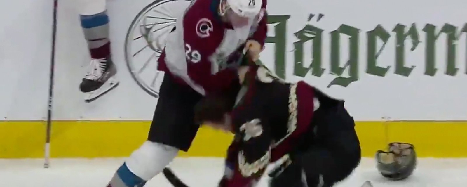 Nathan MacKinnon drops the gloves and absolutely manhandles Christian Fischer