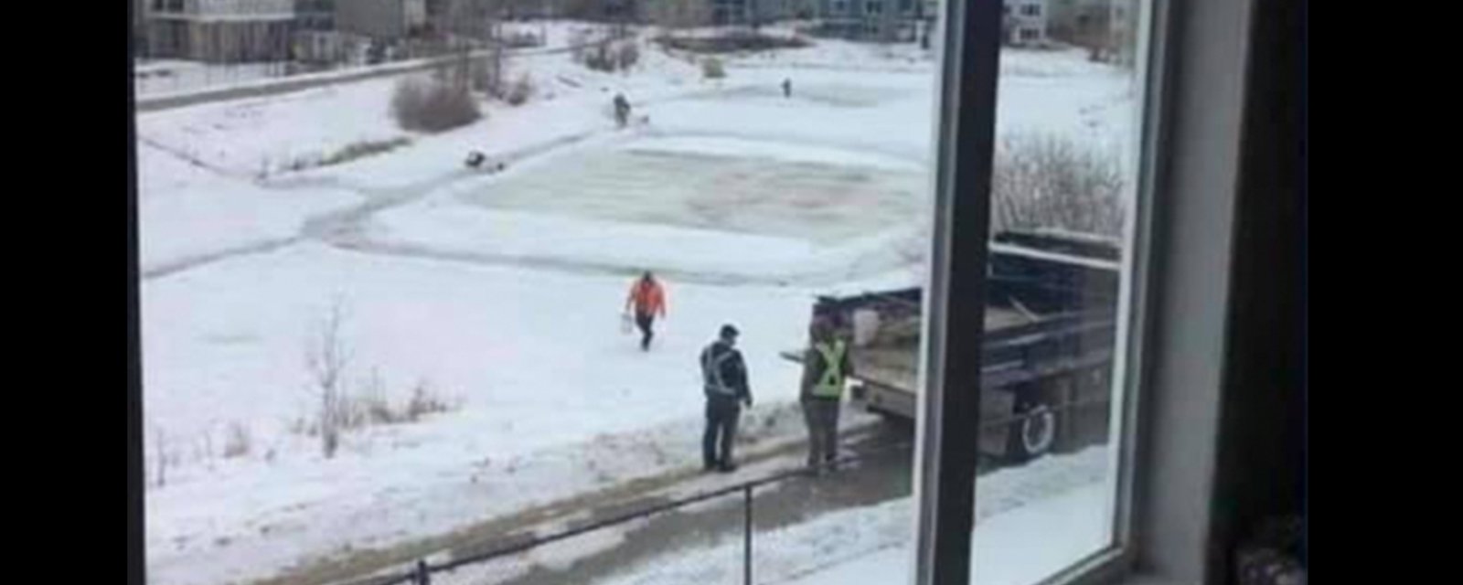 Calgary city workers pour gravel on outdoor rinks, ensuring no one can use them