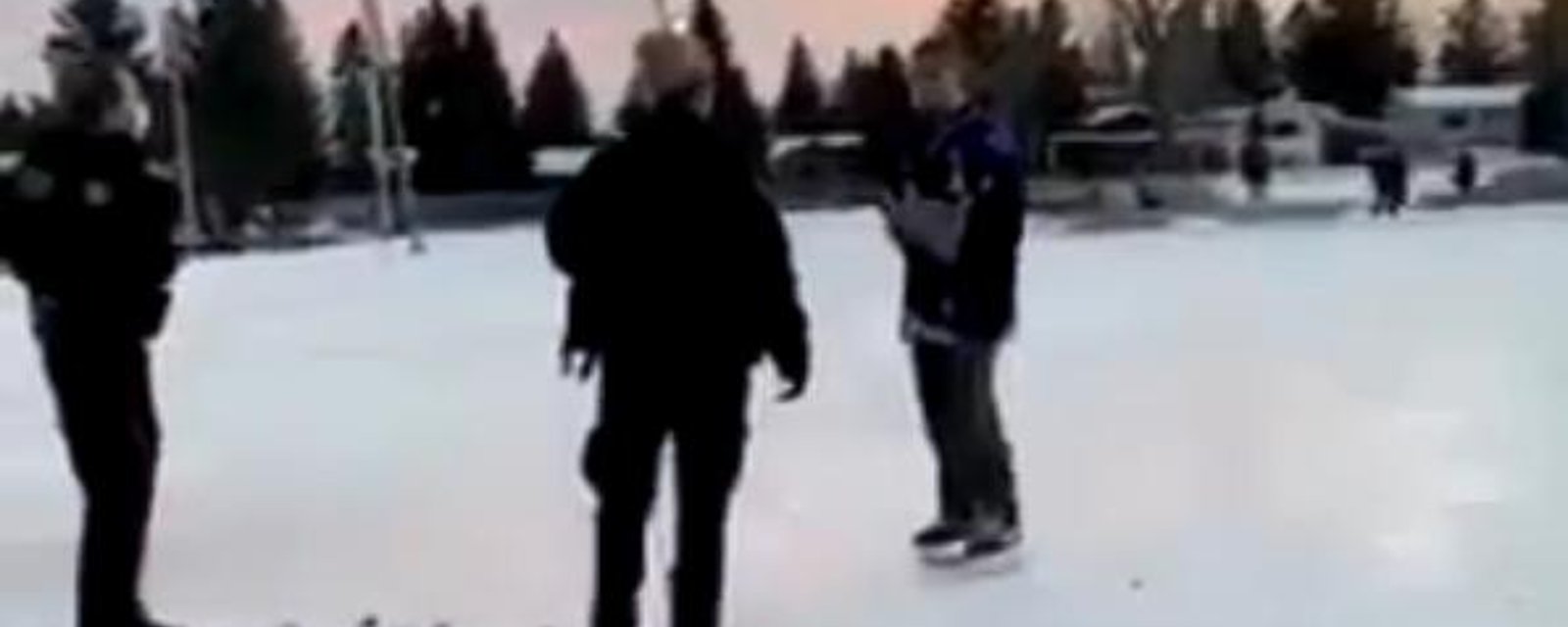 Man violently arrested by Canadian police while playing outdoor hockey.