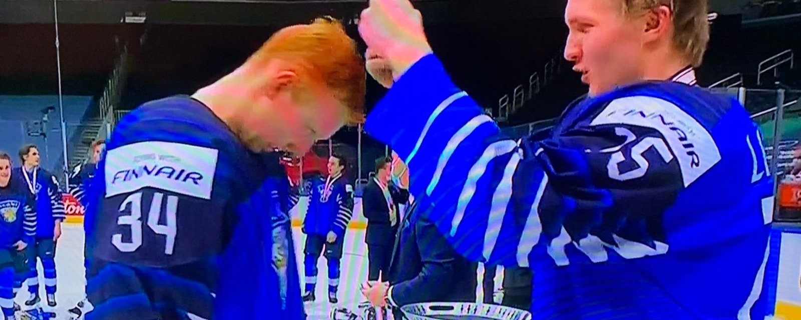 Team Finland forced to receive bronze medal in new touching yet awkward setting 