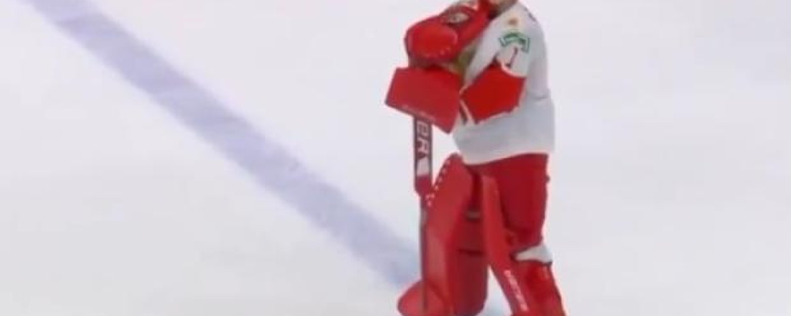 Team Russia goalie Askarov stood at the blue line and watched Team Finland celebrate by himself