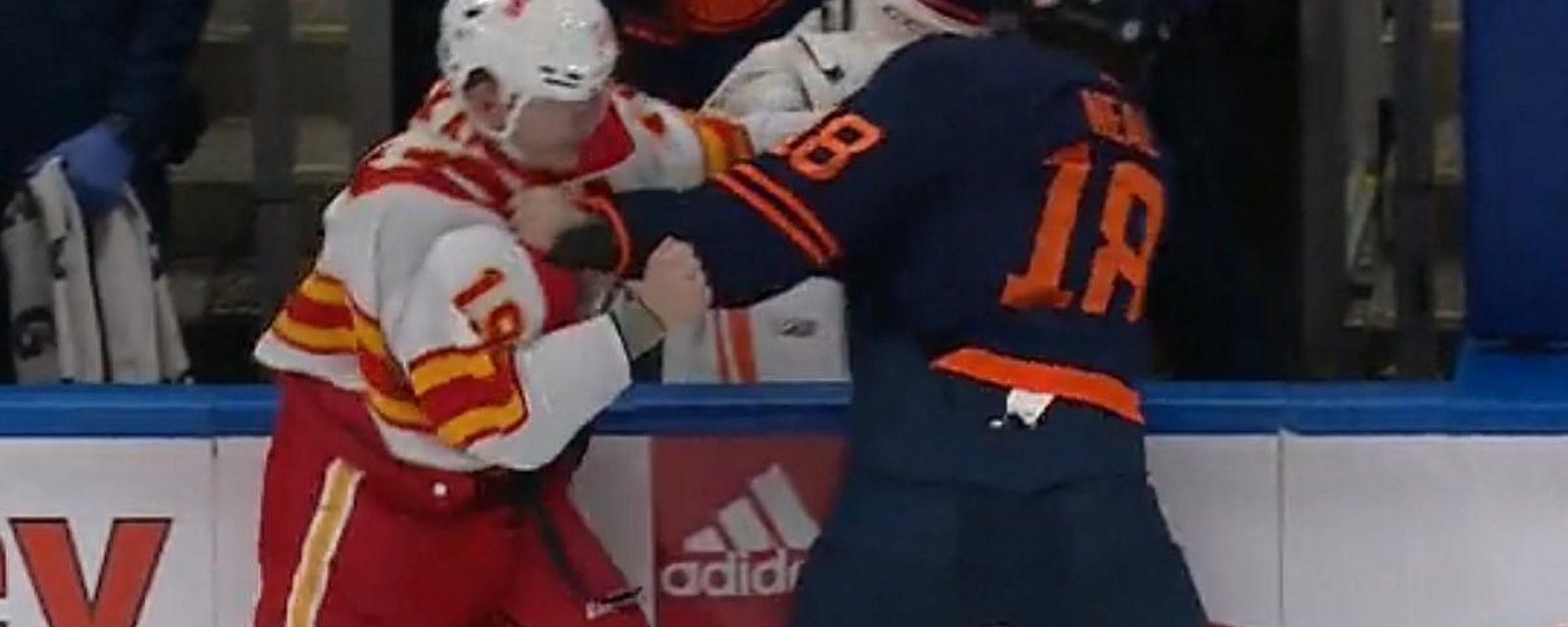 Matthew Tkachuk and James Neal drop the gloves in the Battle of Alberta.