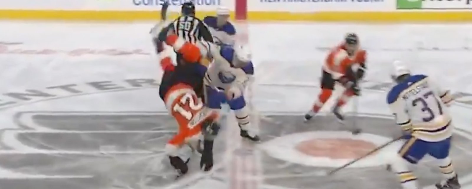 Lazar judo-flips Laughton on the face-off and referees stun everyone with non-call 