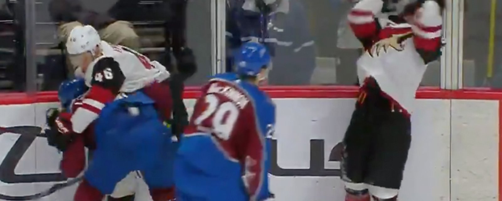 MacKinnon absolutely loses it, throws helmet at Garland's face