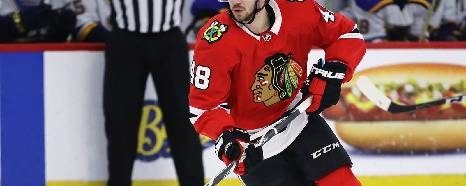 Hawks get going on trade market, reacquire Hinostroza