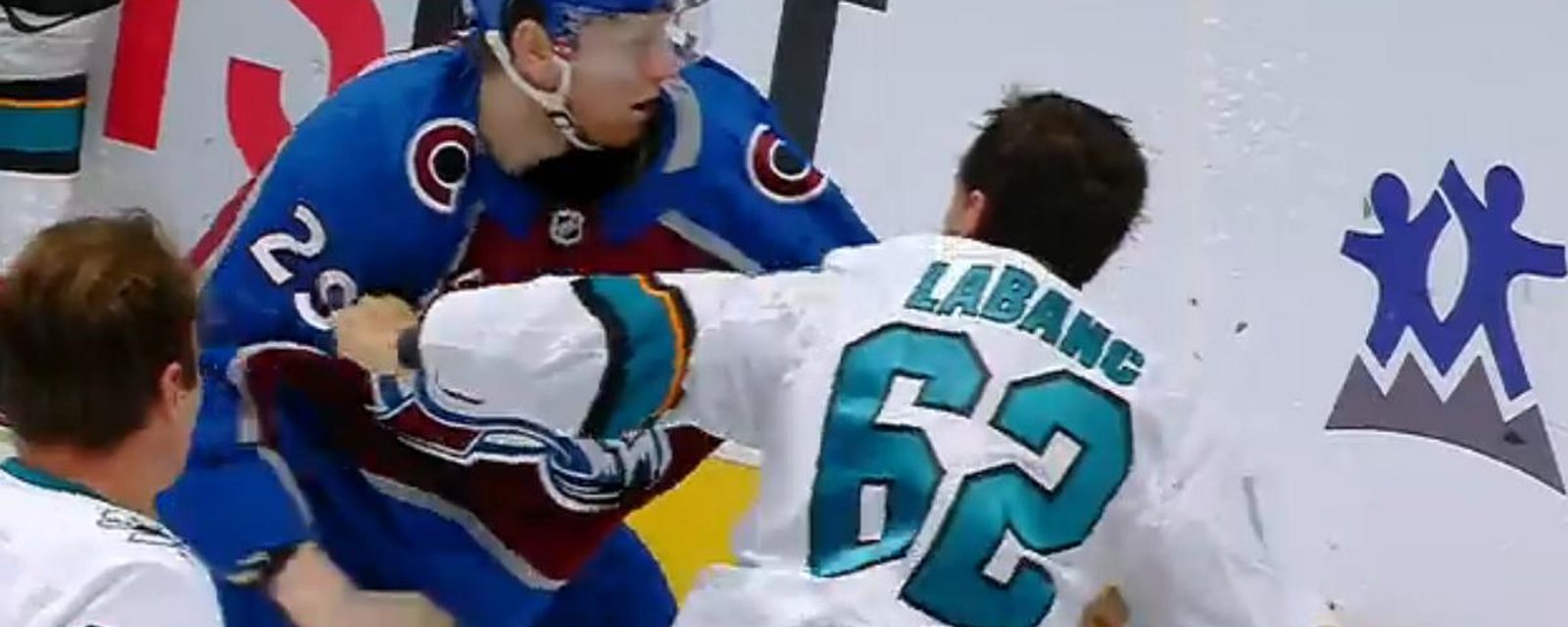 Nathan MacKinnon drops the gloves with Kevin Labanc in the third.