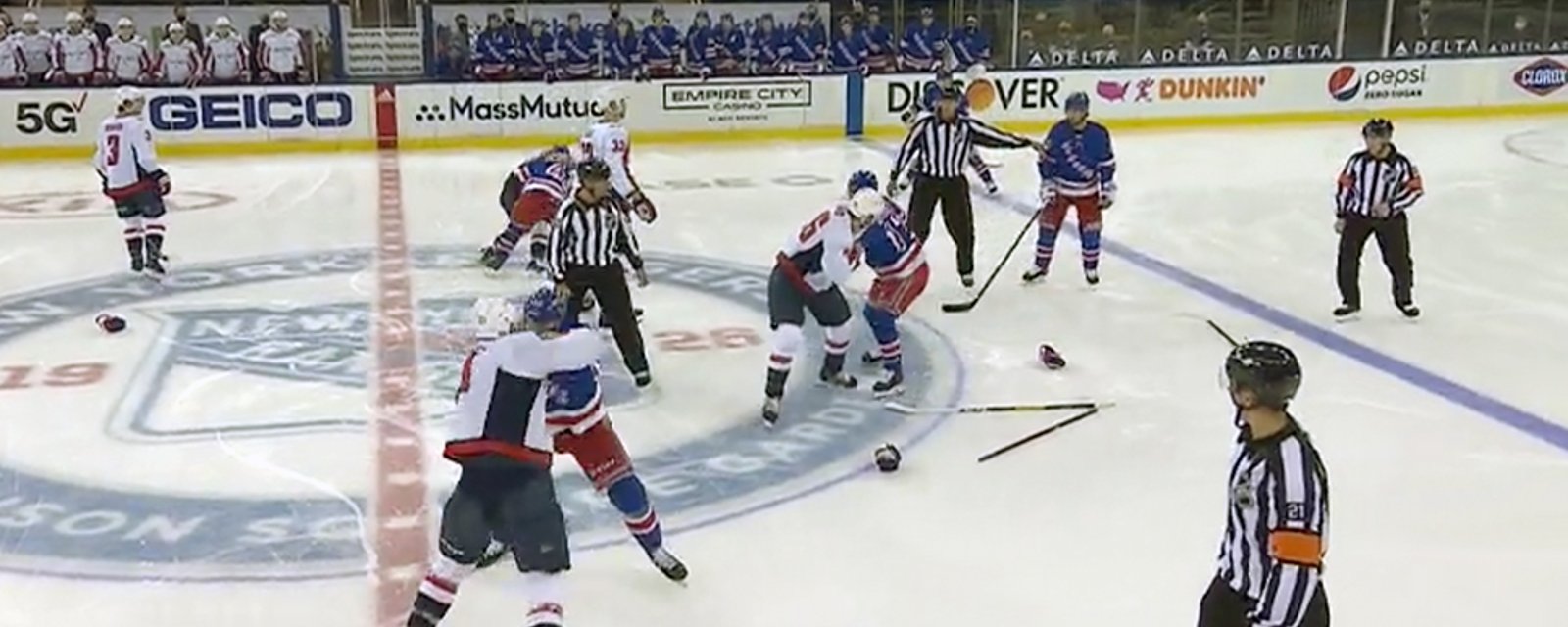 Rangers and Capitals begin the game with an old fashioned line brawl