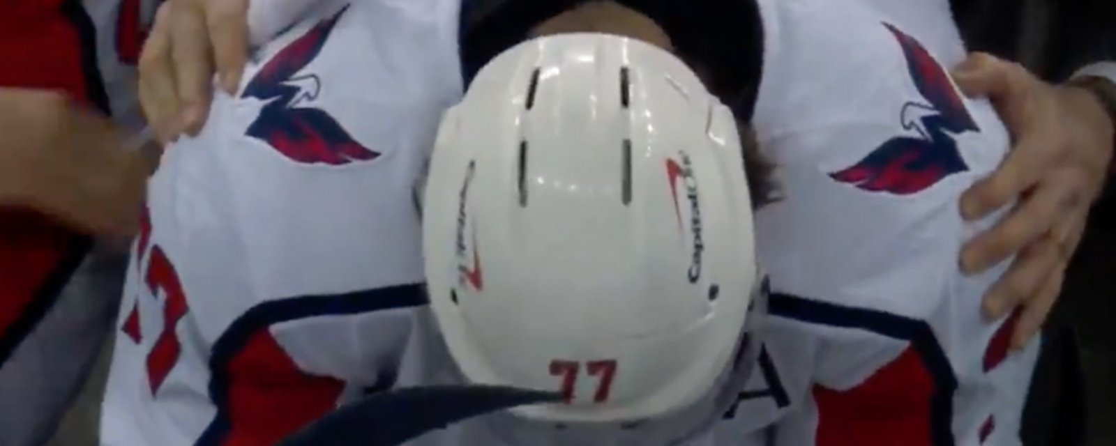 T.J. Oshie wipes away tears after scoring a hat-trick in his first game after his father's death