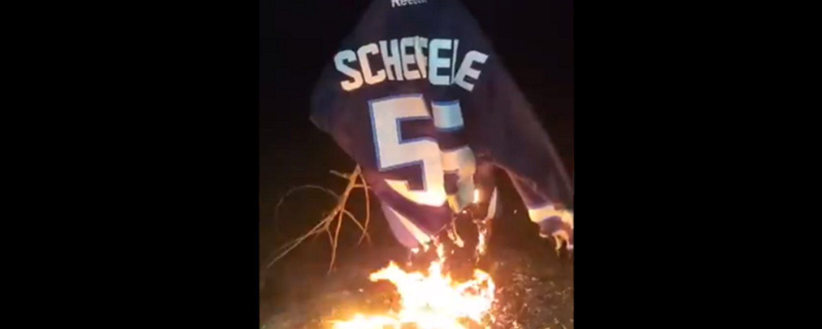 Fan burns his Mark Scheifele jersey after last night's devastating hit on Jake Evans