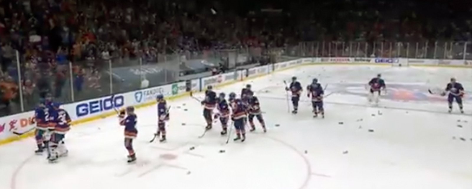 Islanders fans litter the ice with garbage following Game 6 victory