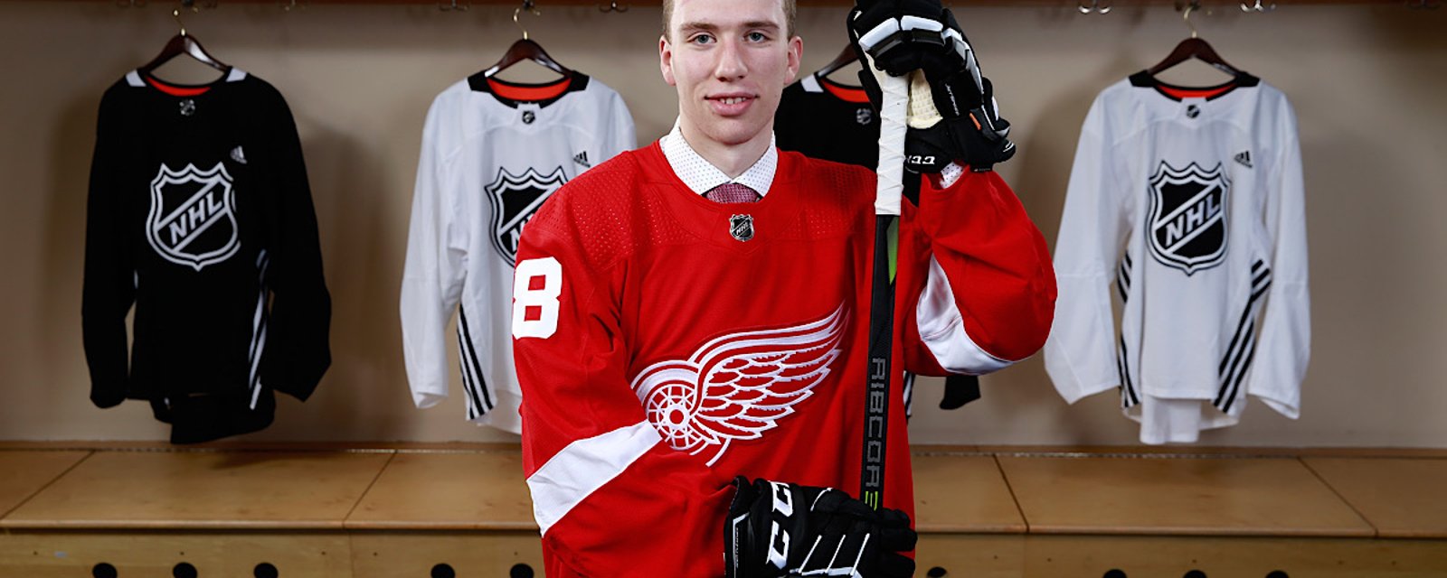 Update: Red Wings prospect Jared McIsaac knocked out cold and taken to hospital in an ambulance.